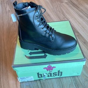 Never worn, brand new with tags, black woman’s combat boots size 6.5